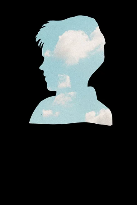 Silhouette of a boy filled with clouds