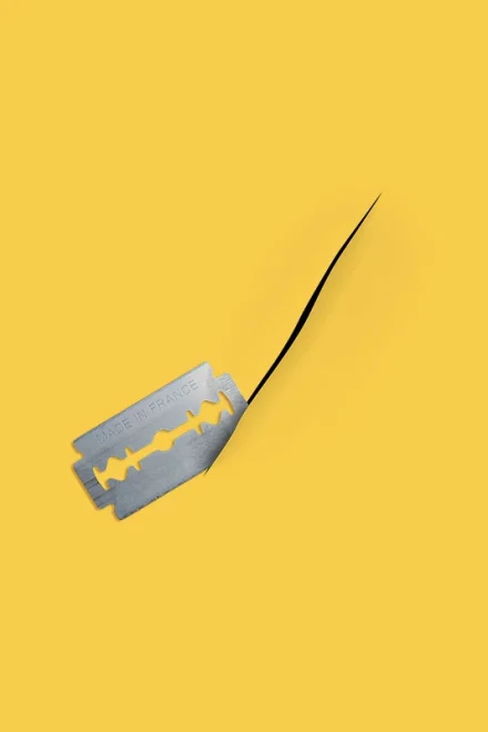 blade cutting a paper